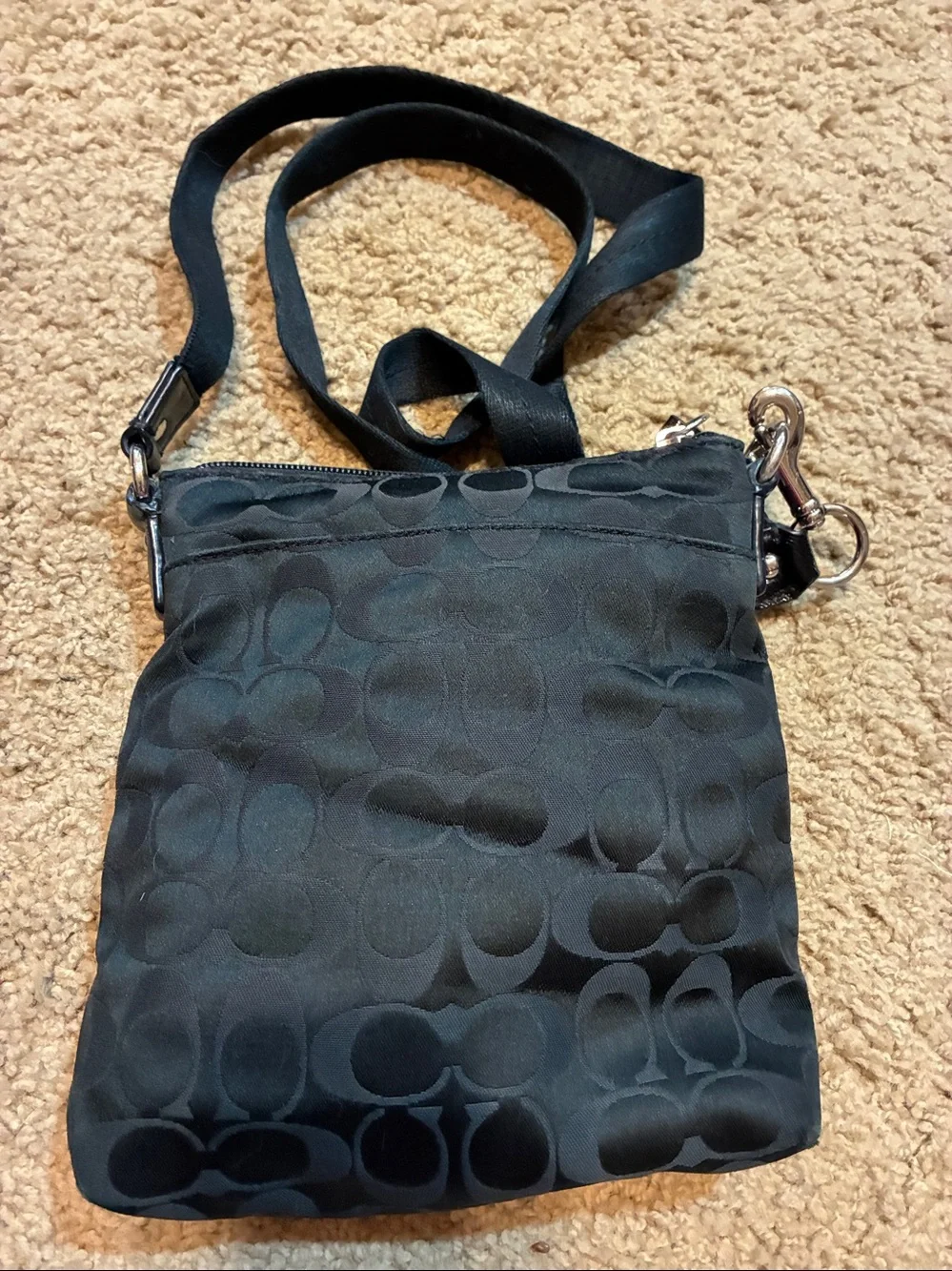 Coach Black Signature Crossbody Purse.Signature logo all over the bag.